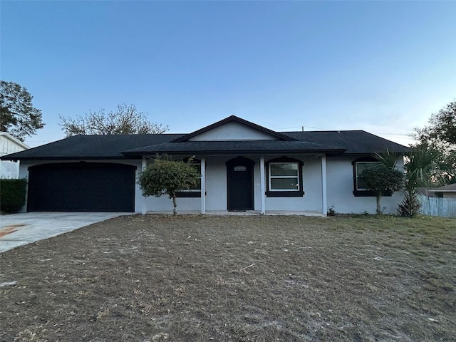 ranch-style house featuring a garage