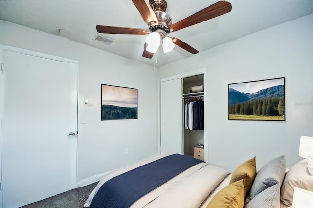 bedroom with a closet, ceiling fan, and carpet flooring