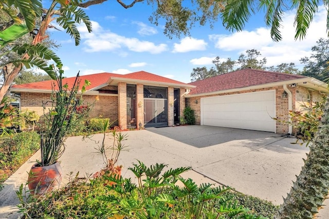 view of front of property with a garage