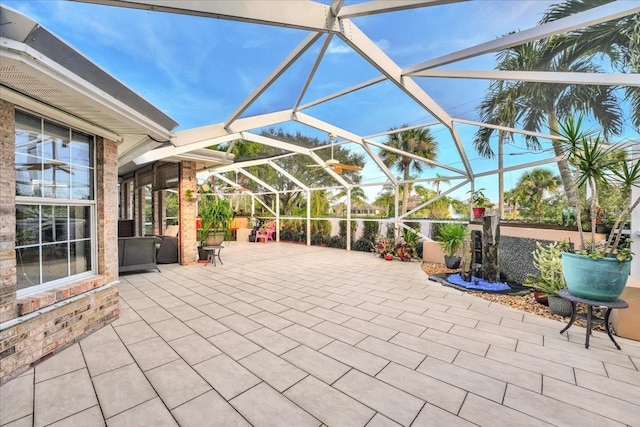 view of patio / terrace with a lanai