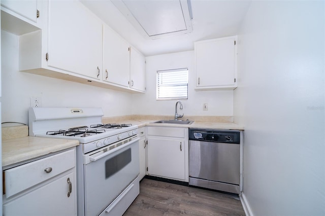 kitchen featuring dark hardwood / wood-style floors, white cabinetry, dishwasher, sink, and white gas stove