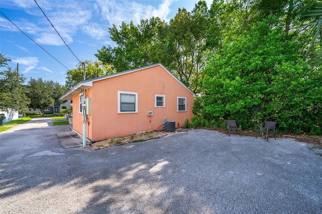 view of property exterior featuring central AC unit