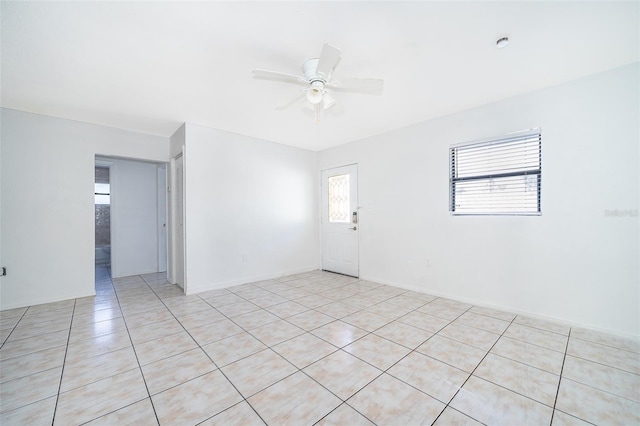 empty room featuring ceiling fan