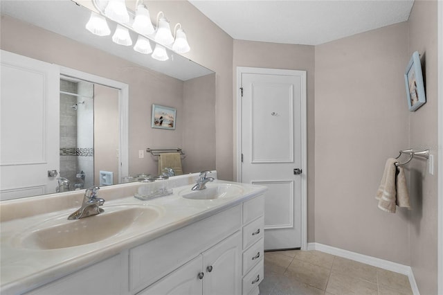 bathroom with vanity and tile patterned floors