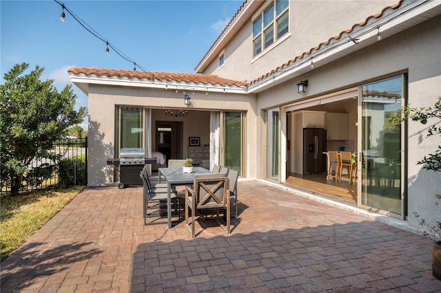 view of patio / terrace with a grill