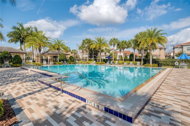 view of swimming pool with a patio area