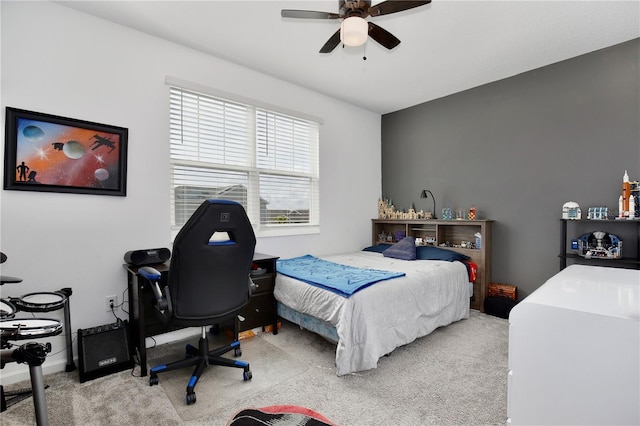 bedroom featuring ceiling fan and carpet flooring