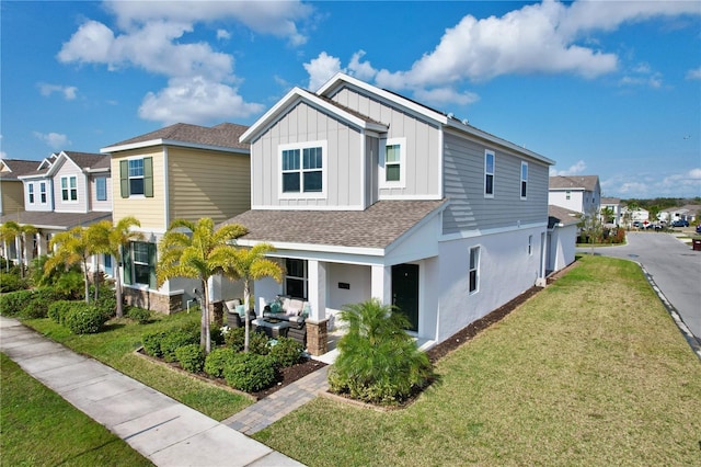 view of front of home with a front lawn