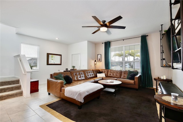 2429 Volunteer Ave, Kissimmee, FL 34744 - living room with tile patterned floors, stairway, baseboards, ceiling fan, and recessed lighting