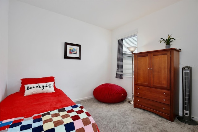 2429 Volunteer Ave, Kissimmee, FL 34744 - carpeted bedroom with baseboards and a heating unit