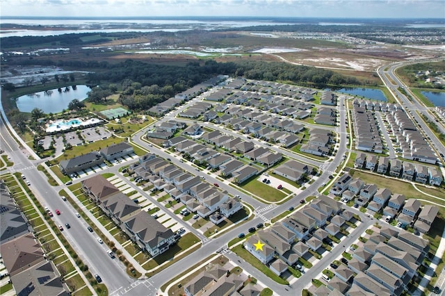 2429 Volunteer Ave, Kissimmee, FL 34744 - birds eye view of property with a water view and a residential view