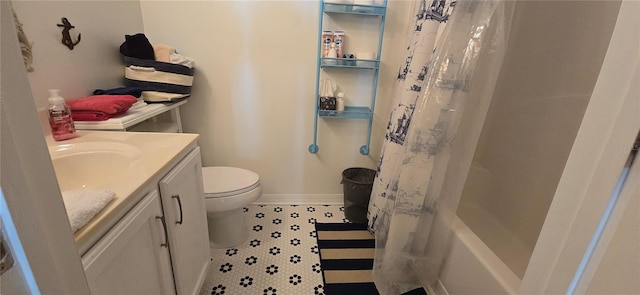 full bathroom with vanity, toilet, tile patterned flooring, and shower / tub combo