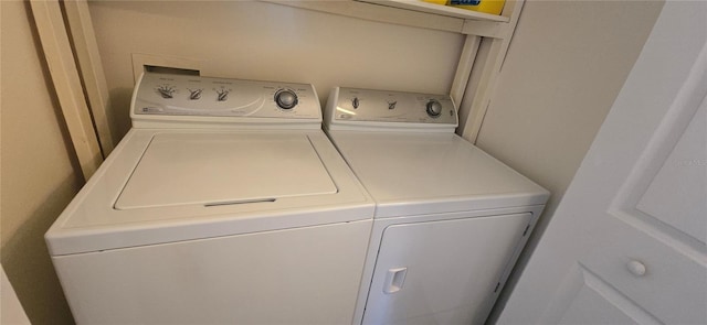 laundry room featuring washing machine and dryer