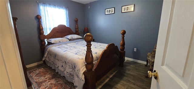 bedroom featuring dark wood-type flooring