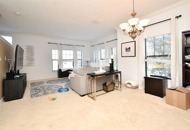 carpeted living room featuring crown molding and a chandelier