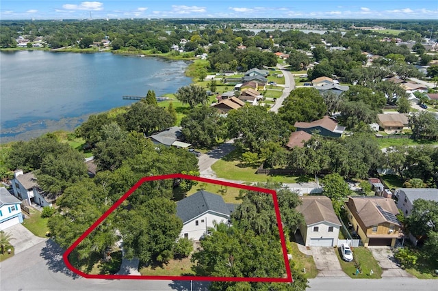 aerial view featuring a residential view and a water view