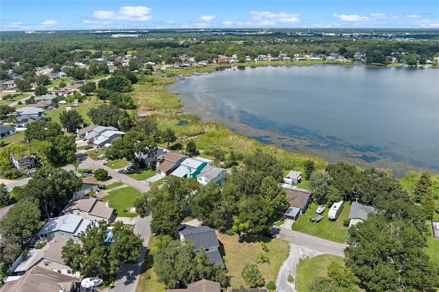 birds eye view of property featuring a water view and a residential view