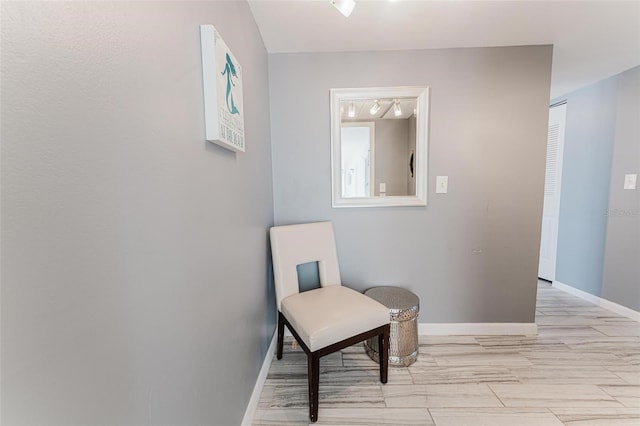 sitting room featuring light wood-type flooring