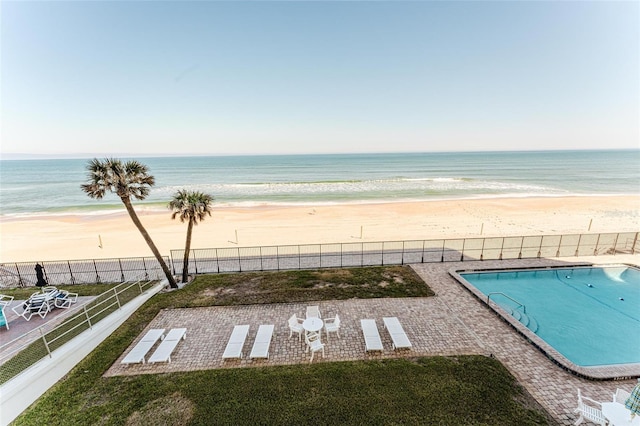 exterior space featuring a beach view