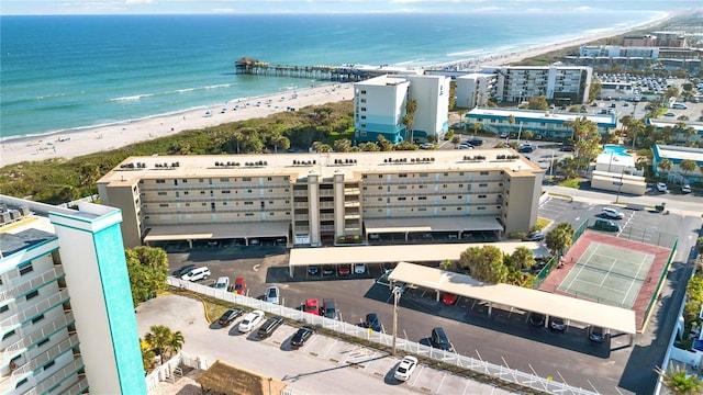 aerial view with a view of the beach and a water view