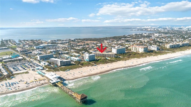 aerial view featuring a water view and a beach view