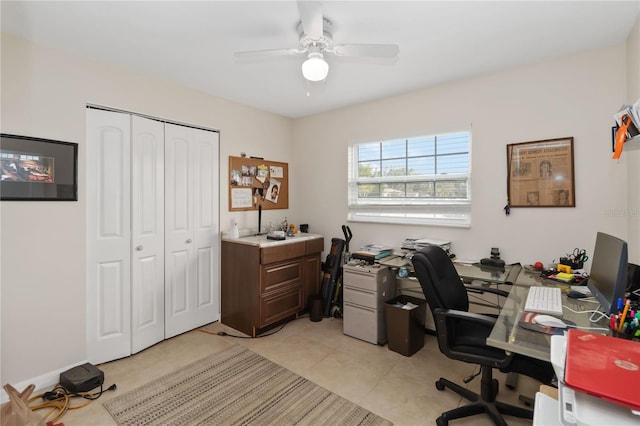 tiled office space with ceiling fan