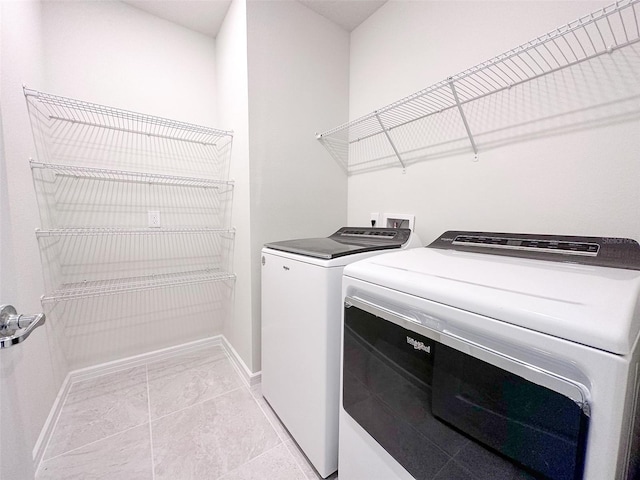 laundry area featuring washer and clothes dryer