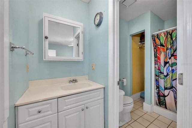 full bathroom featuring toilet, a shower with curtain, tile patterned flooring, and vanity