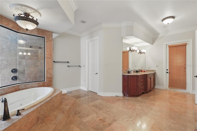 full bathroom with visible vents, ornamental molding, a garden tub, a textured ceiling, and vanity