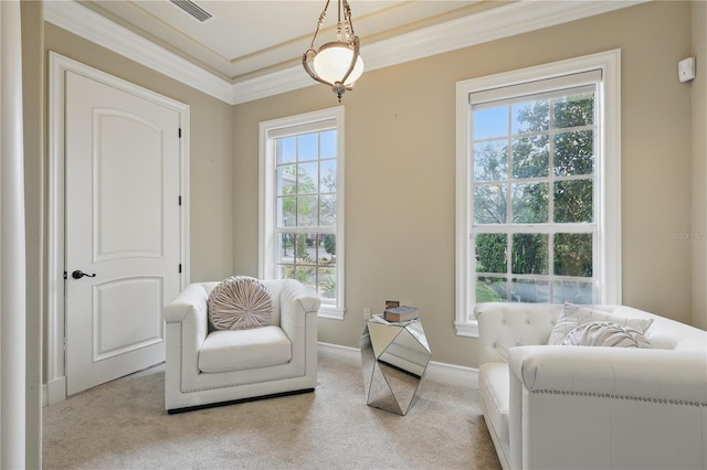 living area featuring light carpet, ornamental molding, visible vents, and baseboards