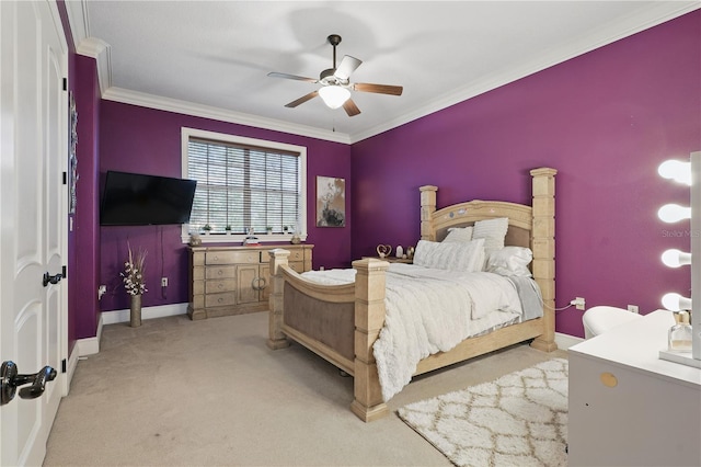 bedroom featuring light carpet, ceiling fan, baseboards, and crown molding