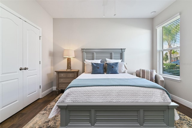 bedroom featuring dark hardwood / wood-style flooring