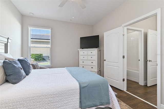 bedroom with ceiling fan and dark hardwood / wood-style floors