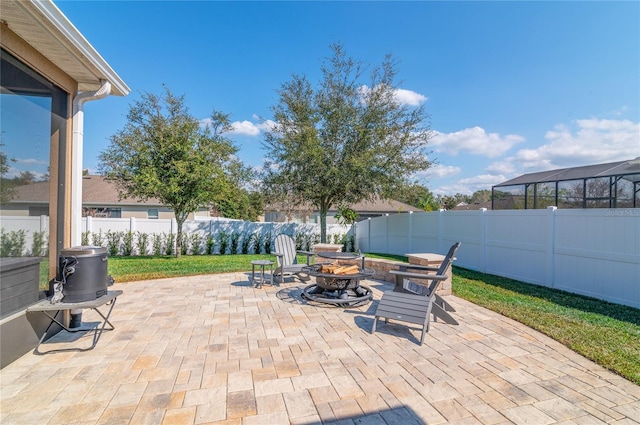 view of patio featuring an outdoor fire pit