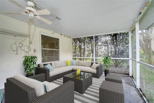 sunroom with plenty of natural light and ceiling fan