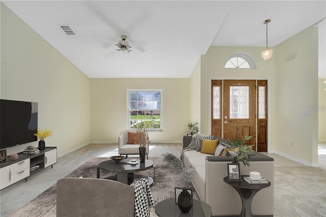 carpeted living room featuring a healthy amount of sunlight and ceiling fan