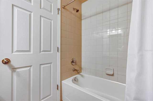 bathroom with shower / bath combo