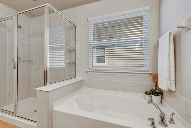 bathroom with independent shower and bath