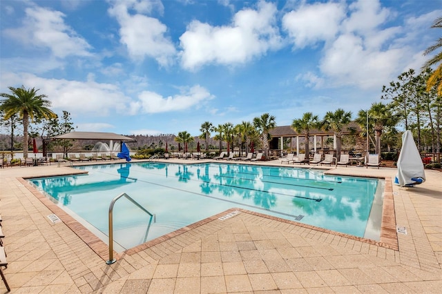 view of swimming pool featuring a gazebo and a patio