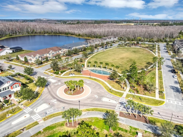 bird's eye view with a water view