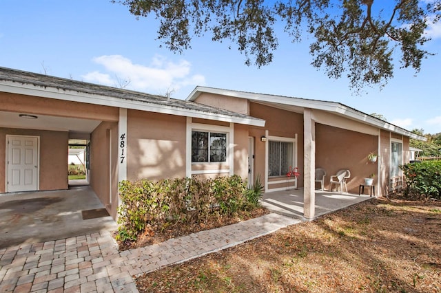 view of front facade with stucco siding