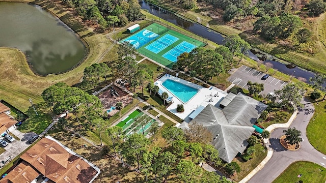 birds eye view of property featuring a water view