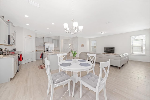 dining room featuring a chandelier