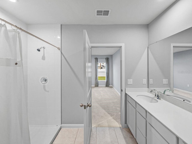 bathroom featuring vanity, tile patterned flooring, and a shower with curtain