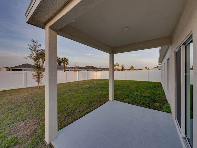 view of patio with a water view