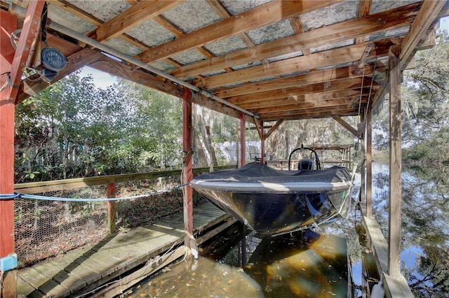 view of dock with boat lift