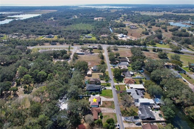 aerial view featuring a residential view and a water view