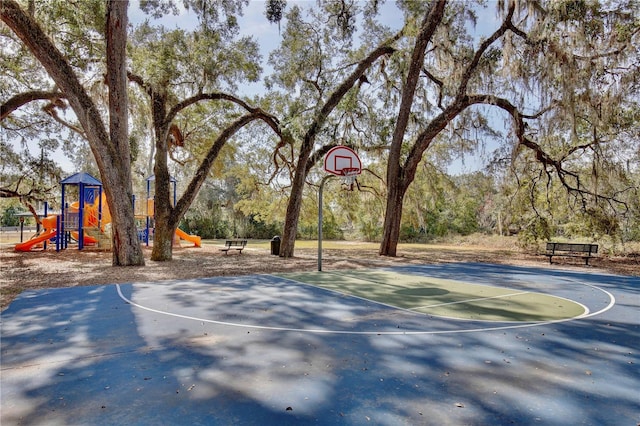 view of sport court with community basketball court and playground community