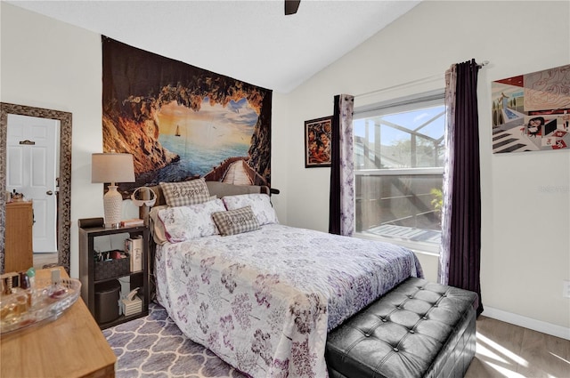 bedroom with lofted ceiling and ceiling fan