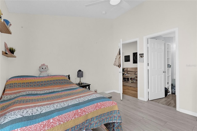 bedroom featuring light hardwood / wood-style flooring and ceiling fan